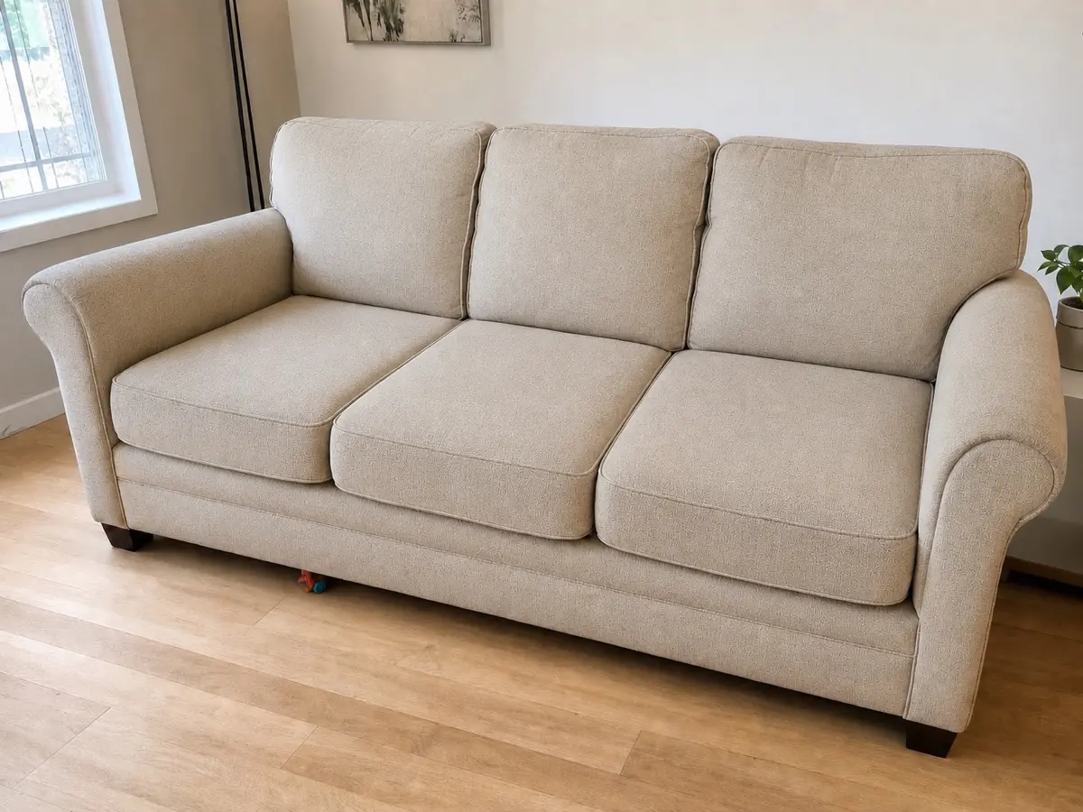 Illustrative beige sectional sofa used to explain sofa cleaning